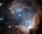 Immagine Hubble di una regione di formazione stellare nella Piccola Nube di Magellano ( NASA Hubble Space Telescope via Unsplash; ritagliata)
