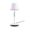 La lampada da tavolo portatile Philips Hue Go in bianco con impugnatura verde acqua. (Fonte: Philips Hue)